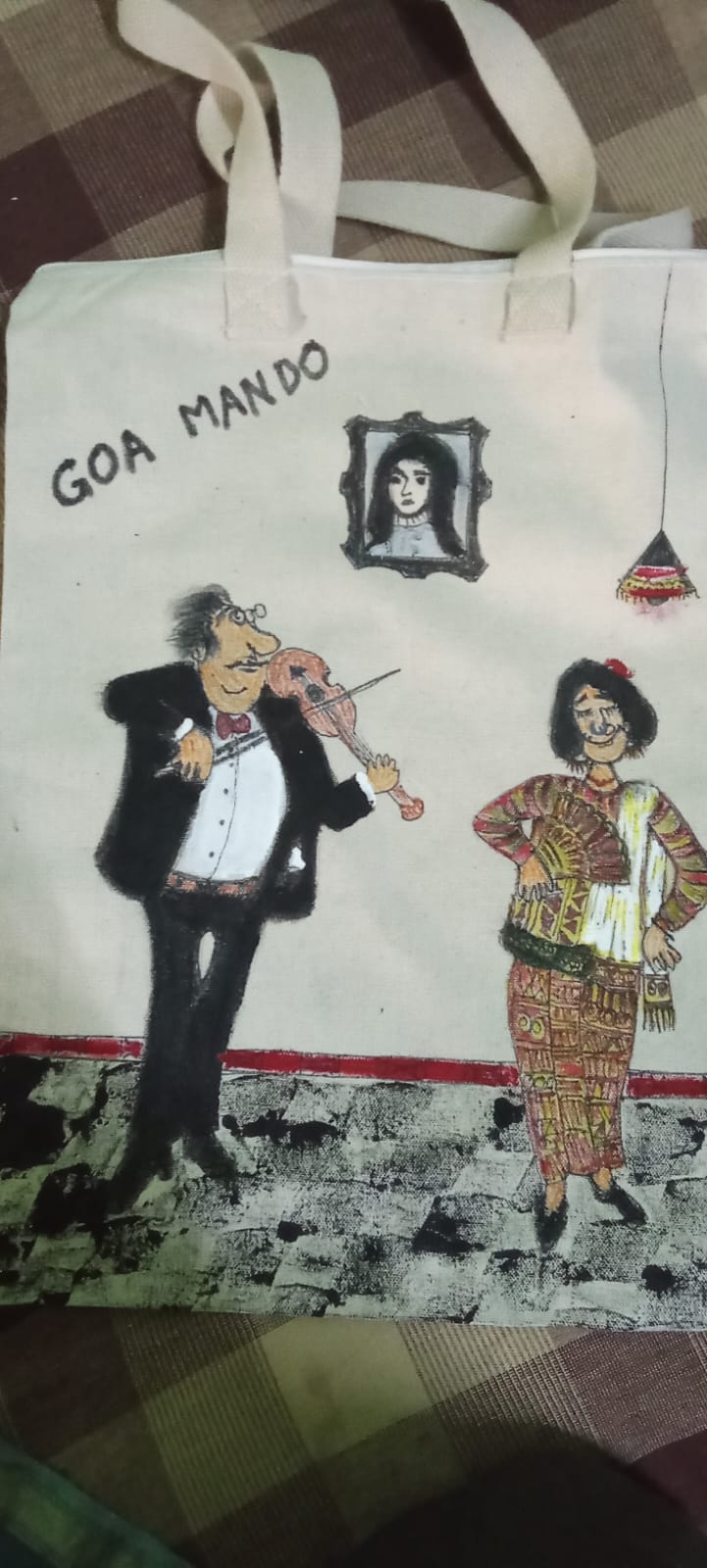 Hand-drawn tote featuring Goa Mando dancers
